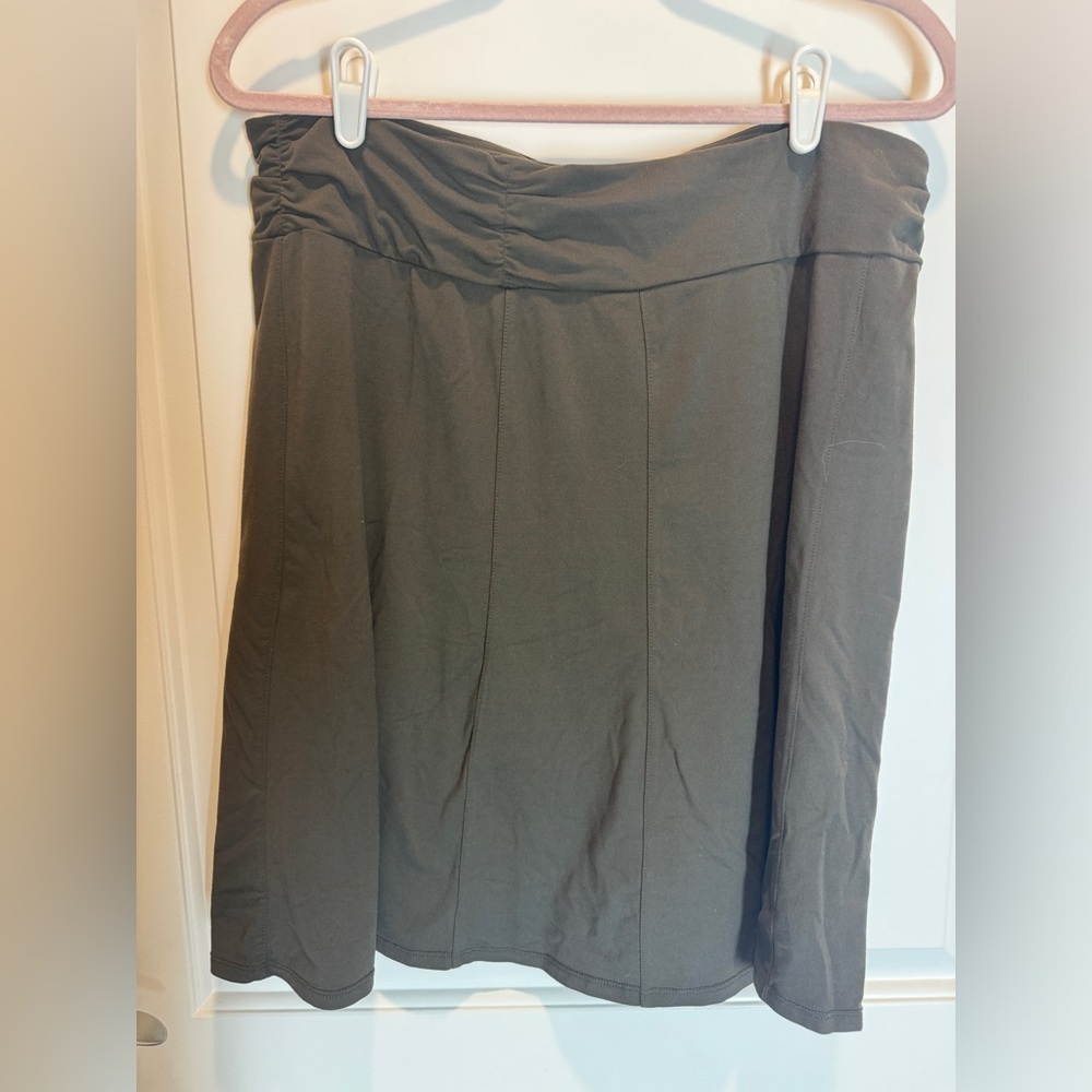 Athleta olive green skirt. No size tag. See‎ measurements.